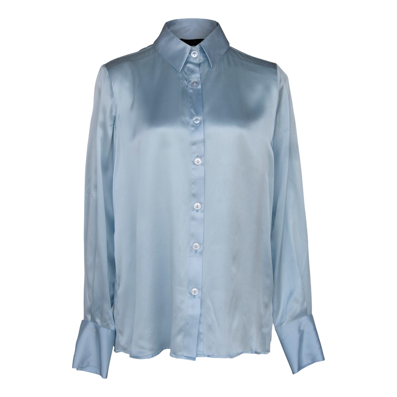 Light blue satin silk blouse on hanger with button-front placket and pointed collar