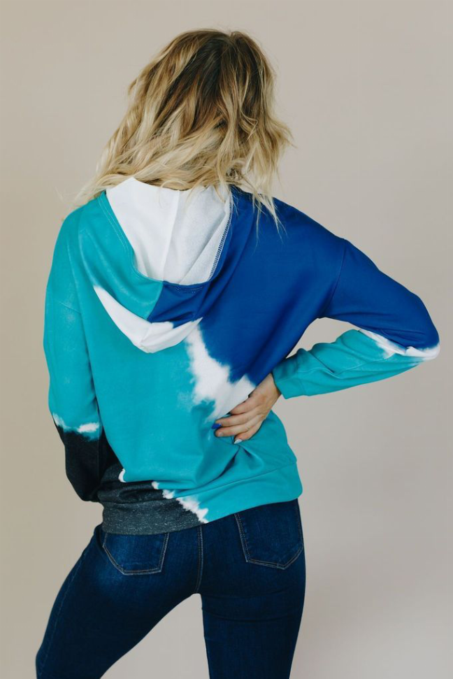 Tie-dye hoodie with hood, turquoise and royal blue back, white and dark accents