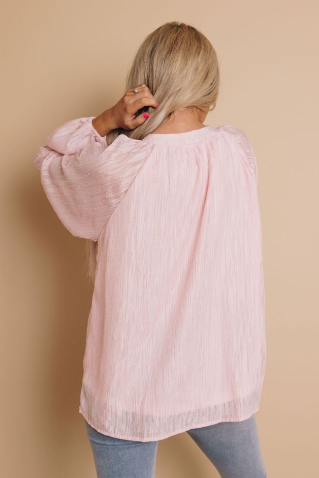 Light pink peasant blouse top, back view with gathered shoulders