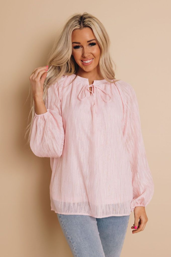 Light pink peasant blouse with drawstring neck tie and billowy long sleeves