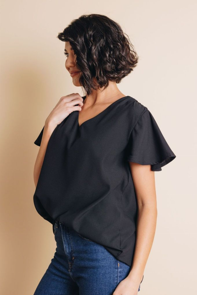 Black short-sleeve V-neck top, side profile with flared sleeve shape