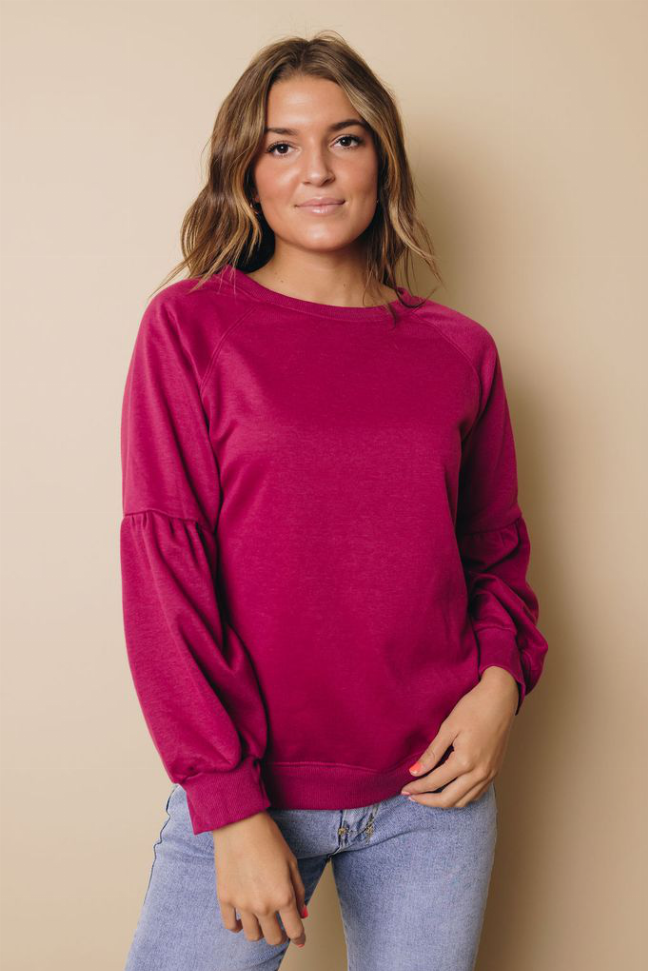 Magenta balloon-sleeve sweatshirt with crew neck, front view with relaxed sleeves