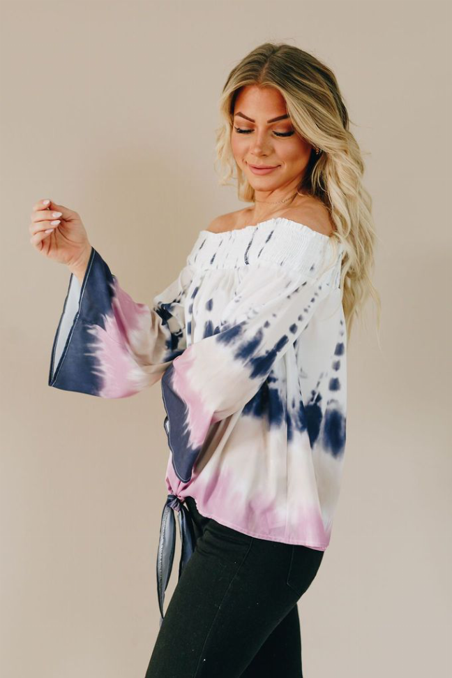 Off-shoulder tie-dye blouse with smocked neckline and long sleeves, pink and blue