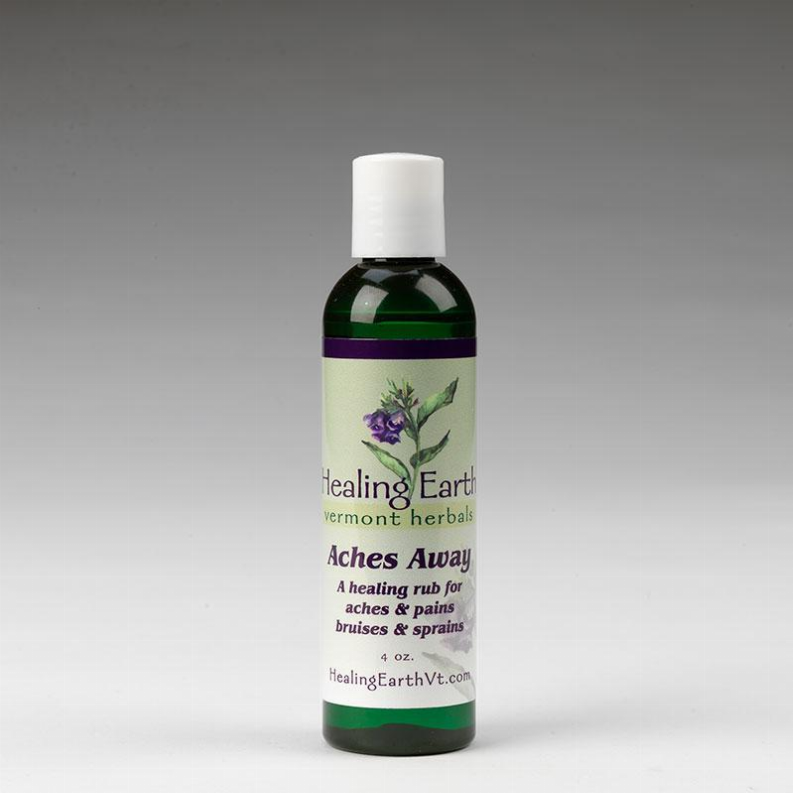 Aches Away massage oil bottle with green label and white cap, 4 oz.