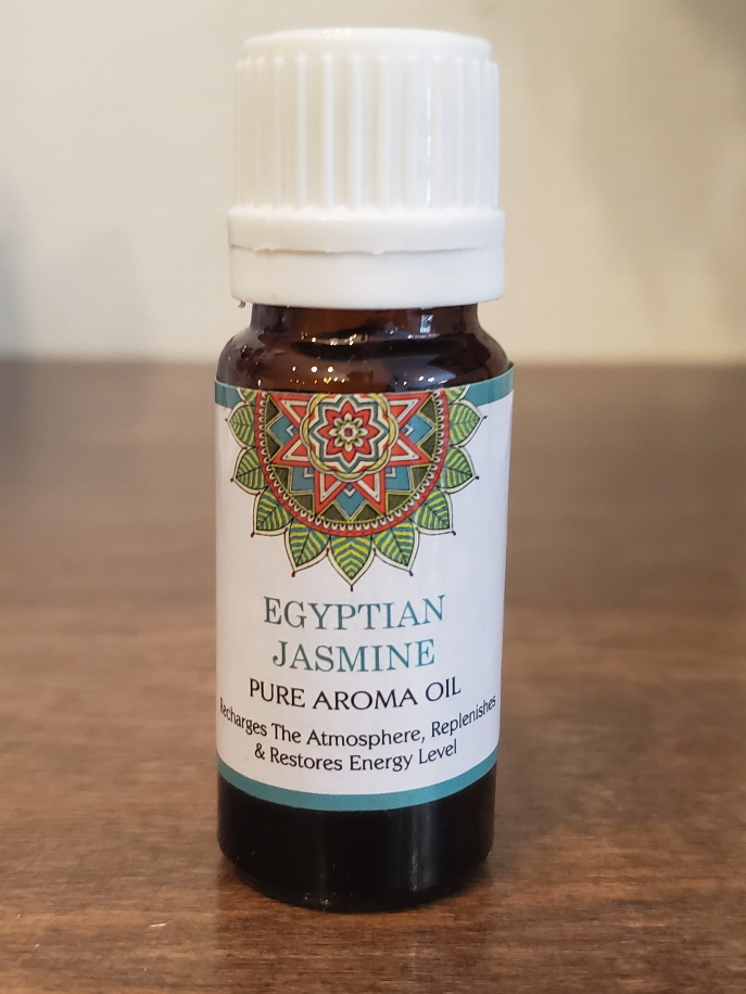 Aromatherapy oil bottle labeled Egyptian Jasmine pure aroma oil with ribbed white cap