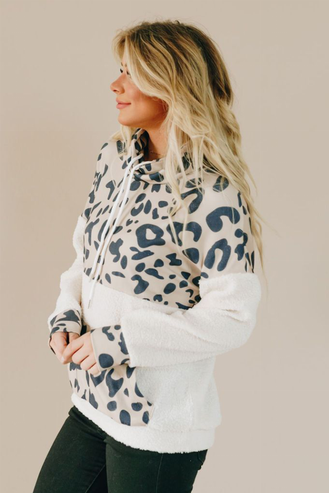 White leopard-print pullover hoodie with blue-gray spots and drawstring hood