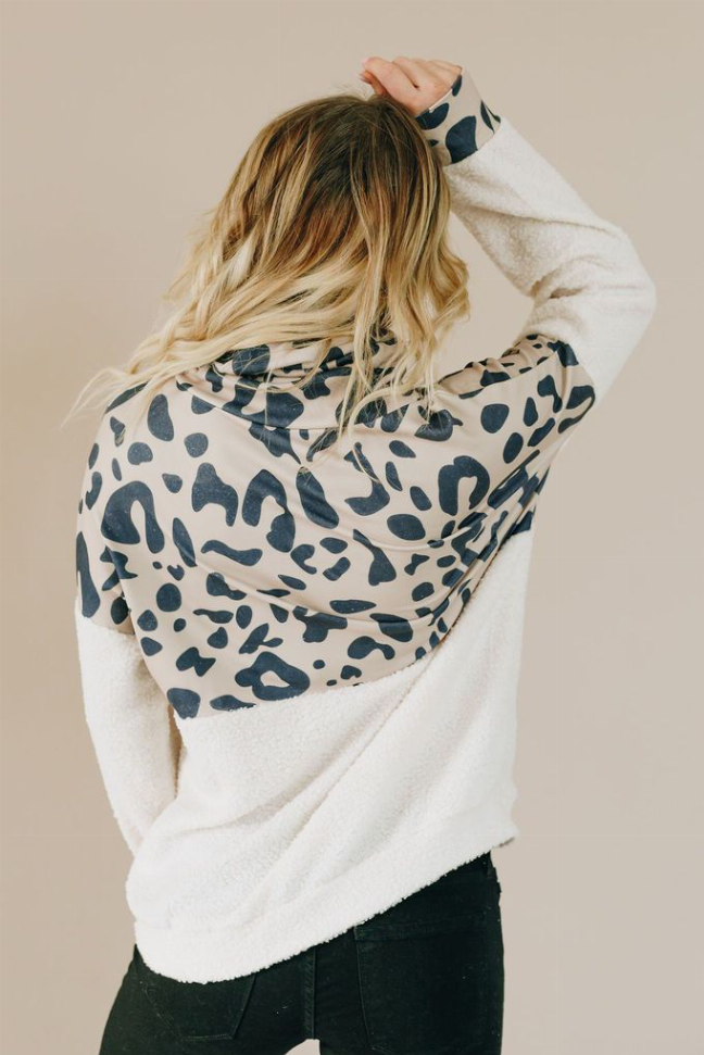 Spotted leopard pullover hoodie, white fleece with full-coverage blue animal print