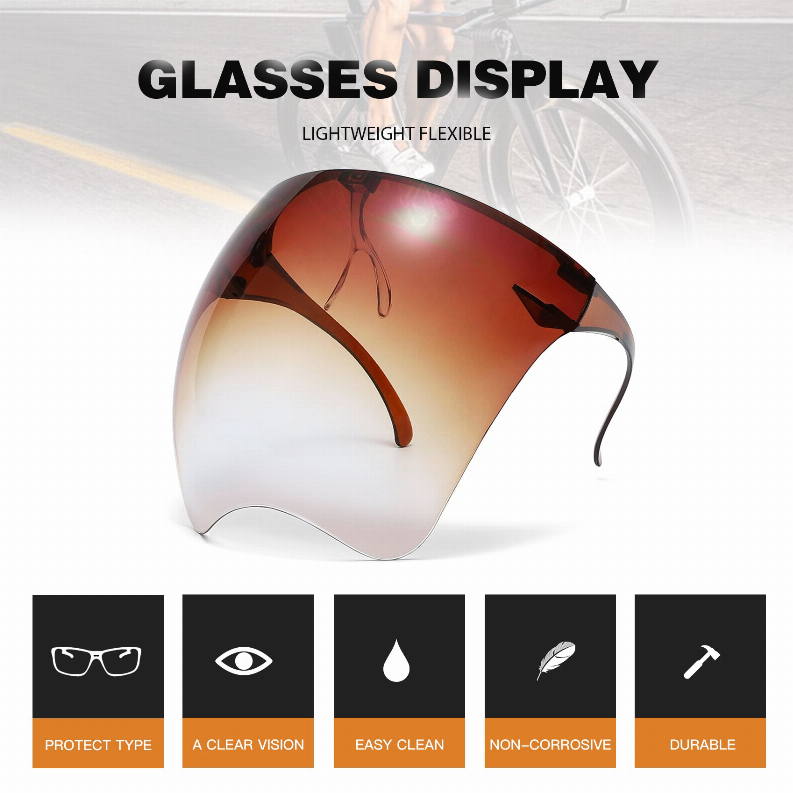 Protective goggles with amber gradient lens and flexible dark temples, front angle