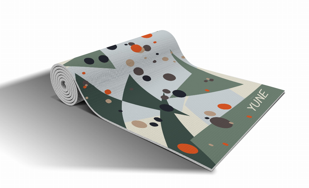 Rolled yoga mat with green/gray abstract geometric pattern and multicolor dots (Basalt design)