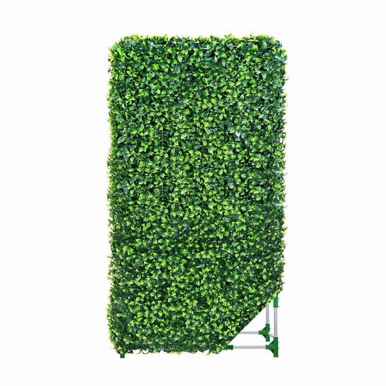 Artificial green faux-leaf hedge panel with dense foliage on aluminum stand base.