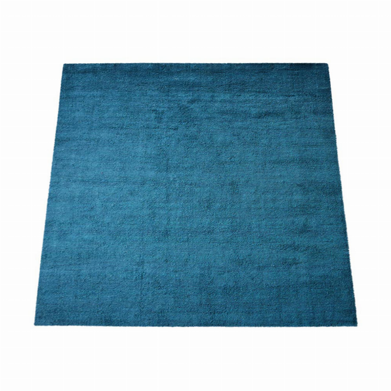 Teal-blue square area rug with flat woven surface, even edges