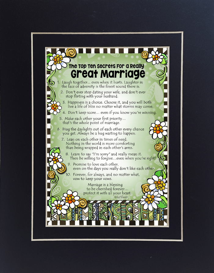 Framed quote artwork with daisies, green lettering, and patterned corner accents.
