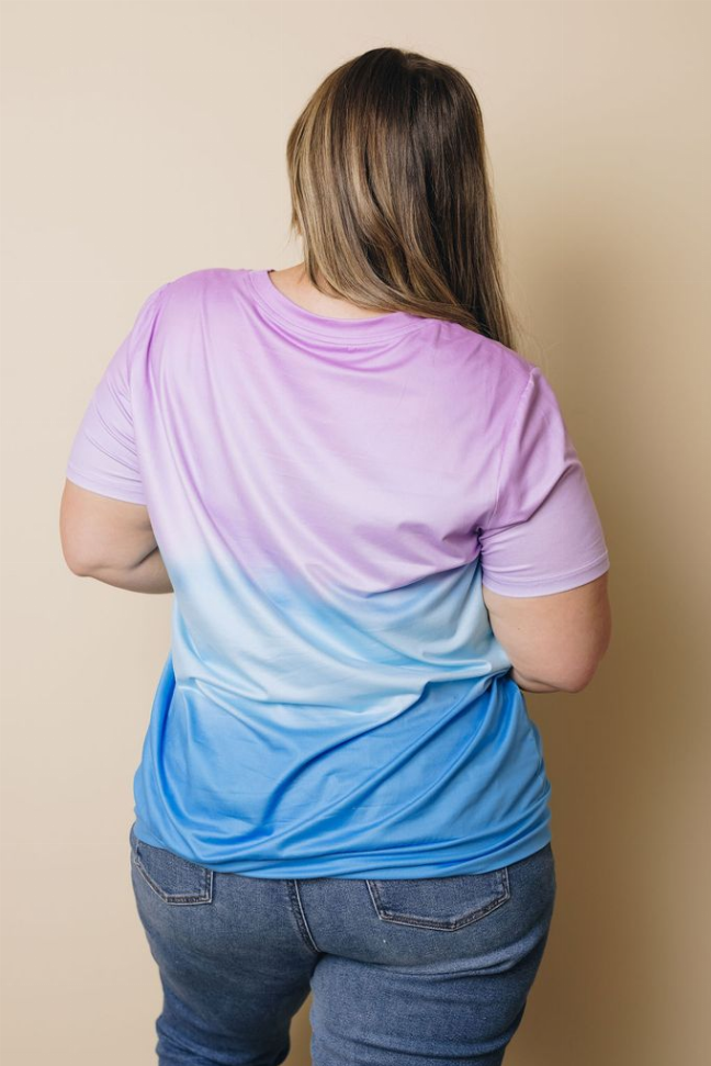 Plus size tie-dye T-shirt back view, lavender to light blue gradient with gathered side drape