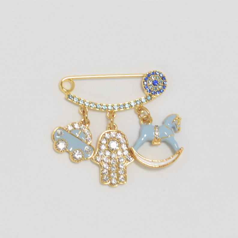 Gold-tone baby safety pin with blue round crystal detail and hanging rhinestone charms