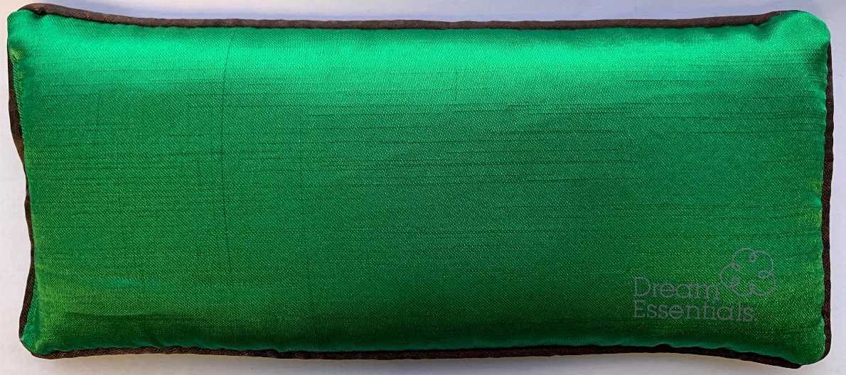 Green flax seed eye pillow with stitched edges and Dream Essentials logo