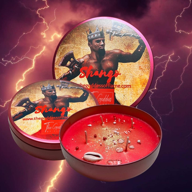 Stacked round candle tins; front tin has red wax with sparkly toppings