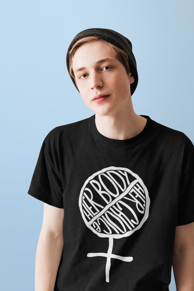 Black graphic T-shirt worn by model with white circle fist and female symbol print