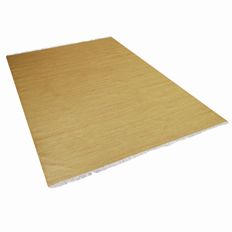 Solid mustard wool kilim area rug, flatwoven texture, corner view