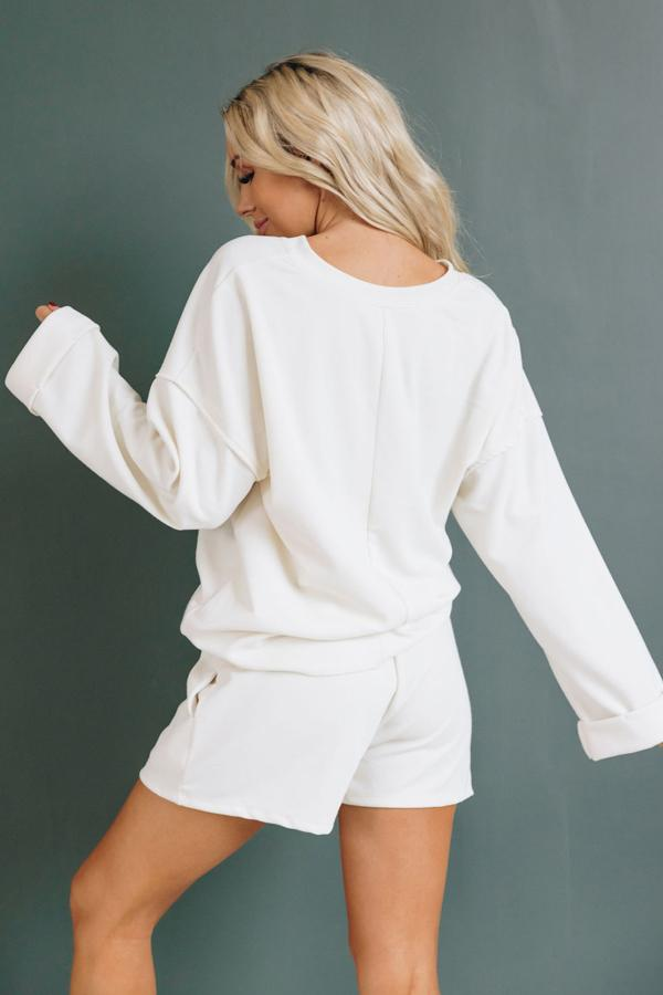 Cream two-piece loungewear set, long-sleeve back top with elastic waist shorts