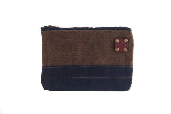 Small zipper bag, brown fabric with navy base, brass hardware on front pocket
