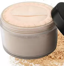 Powder jar with pale lid and dark cap beside the container
