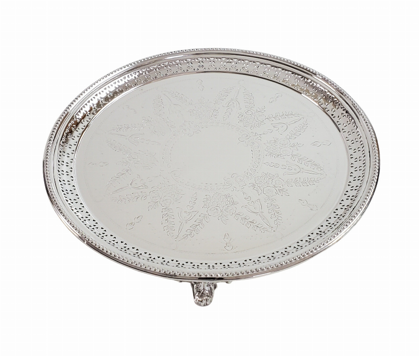 Oval silver plate salver with beaded pierced edge, engraved floral center, raised on feet