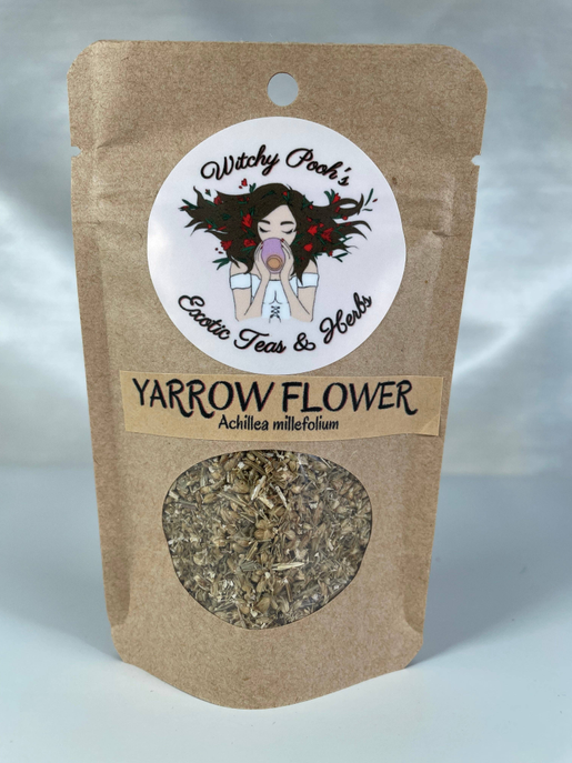 Dried yarrow flowers in brown kraft pouch with round window showing dried flakes