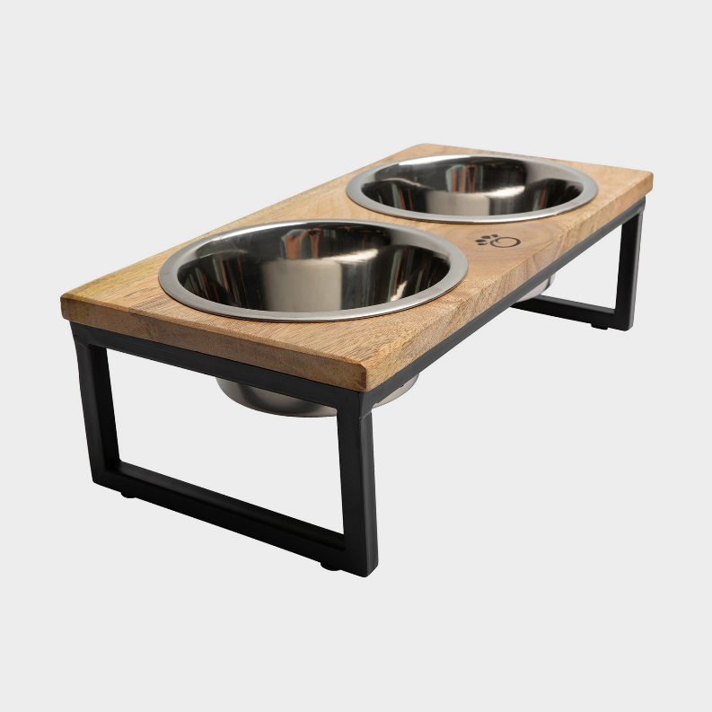 Two stainless steel bowls on wood feeder base with black metal supports