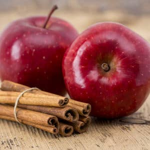 Cinnamon red apples with cinnamon sticks