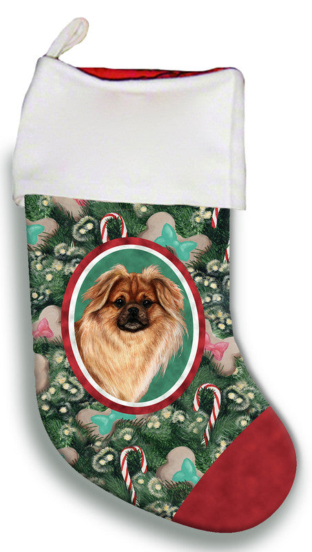 Red and white Christmas stocking with a dog face in a green wreath