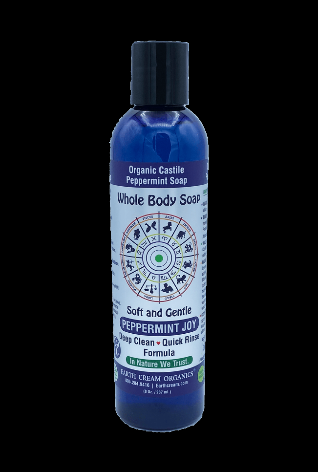 Whole body castile liquid soap bottle with peppermint joy and 'In Nature We Trust' badge