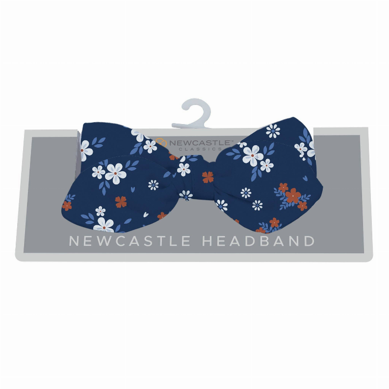 Navy floral bow baby headband with white flowers and orange accents