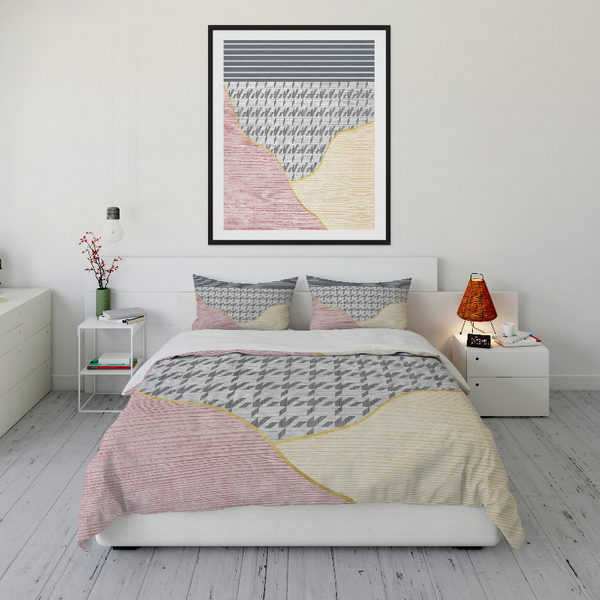 Comforter set with gray houndstooth and pink/cream wave panels, two matching pillows
