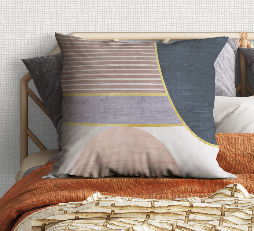 Multicolor accent pillow with striped fabric, dark blue panel, and rounded face-like motif