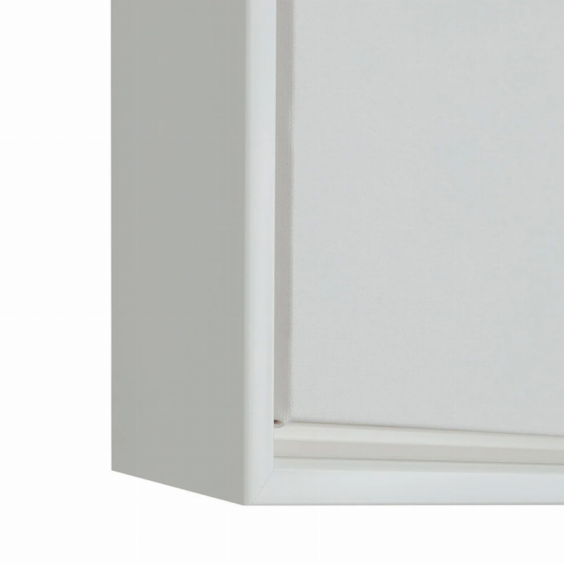 Framed art print corner with white mat and gray backing panel