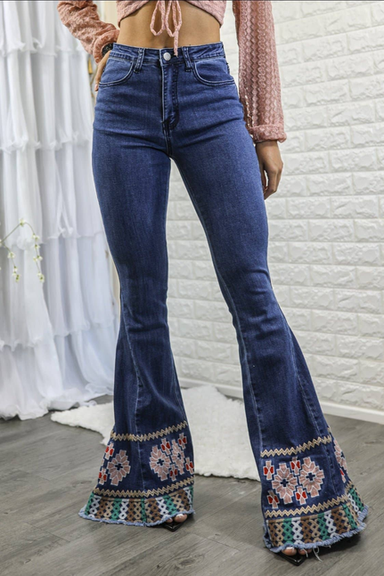 Women’s dark blue high-rise bell-bottom jeans with embroidered flared hem panels