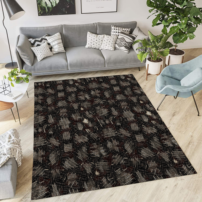 Low pile carpet with abstract multicolor speckle pattern, flat woven look.