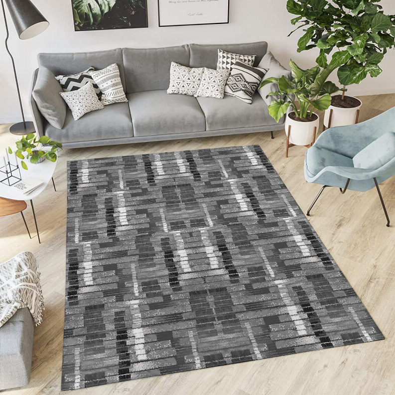 Low pile carpet, rectangular dark gray with light gray abstract geometric pattern