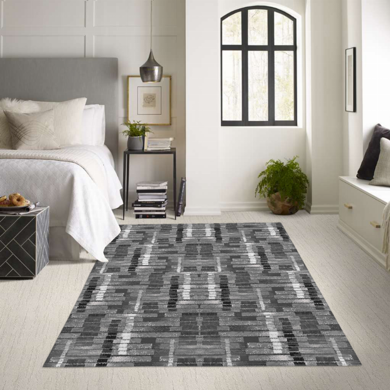 Low pile area rug, dark gray with light gray abstract stripe and block design