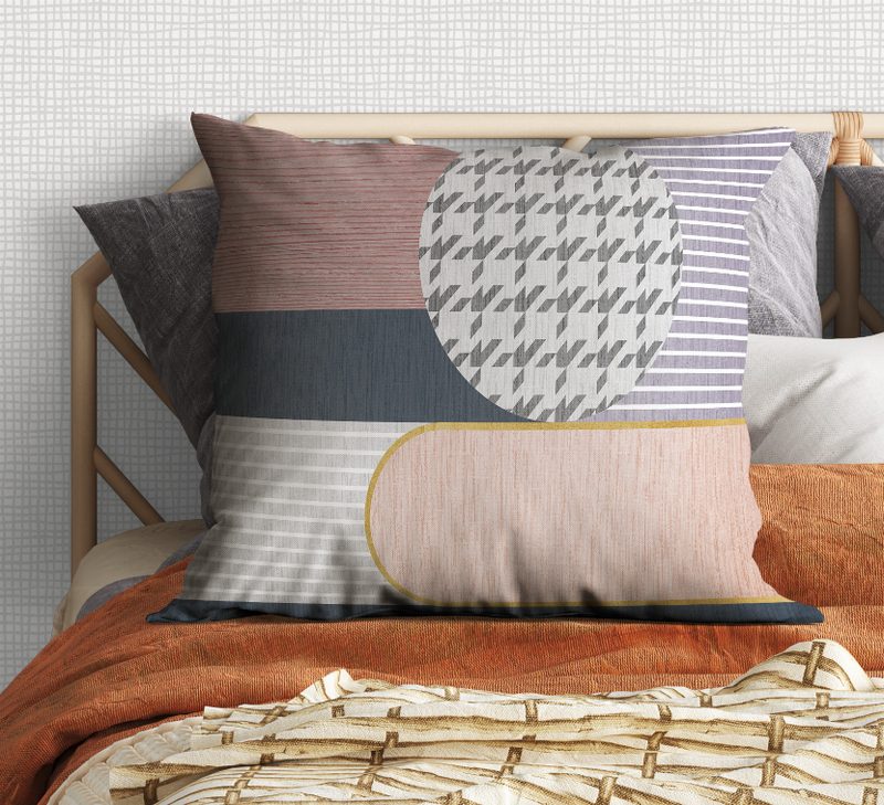 Multi-color geometric patchwork pillow with large circular motif and layered stripes