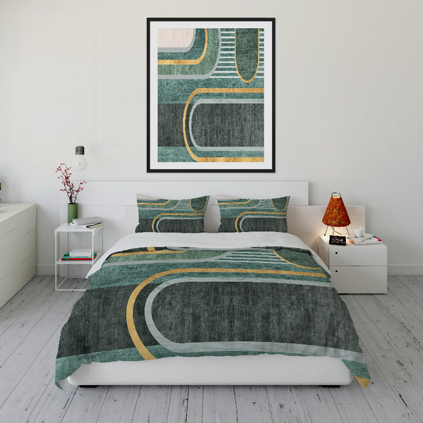 Geometric comforter set with teal, gray, and gold curved stripes and two pillows