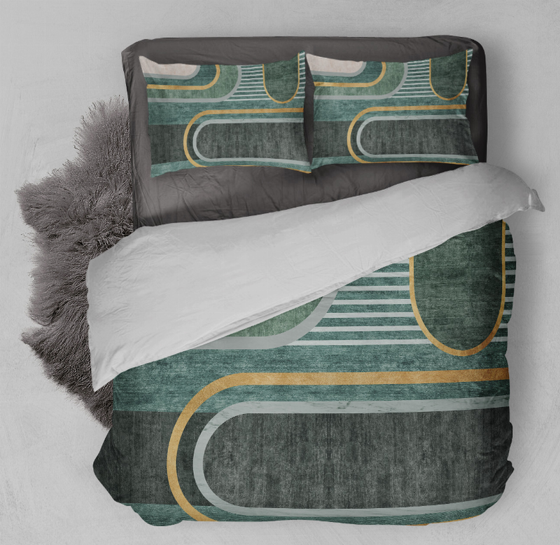Teal and charcoal comforter with gold and white curved line pattern, two pillowcases