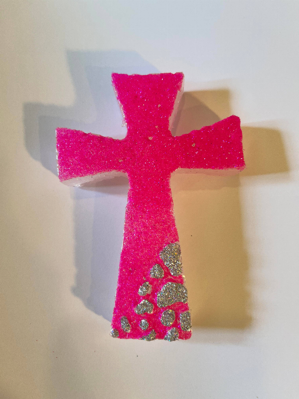 Pink glitter cross ornament with leopard-print design on lower section