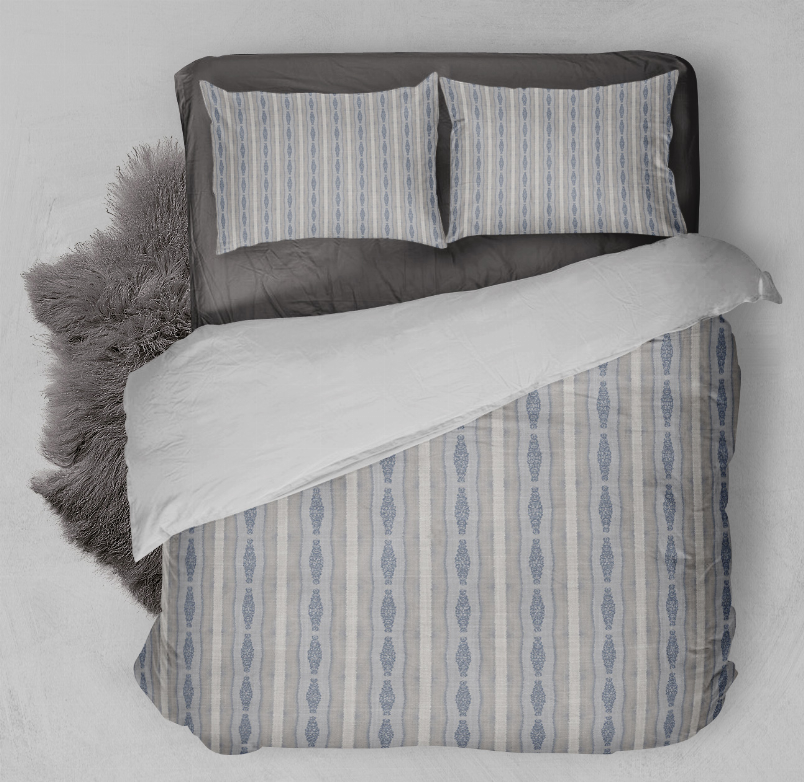 Blue and white striped comforter set with two pillow shams, top view