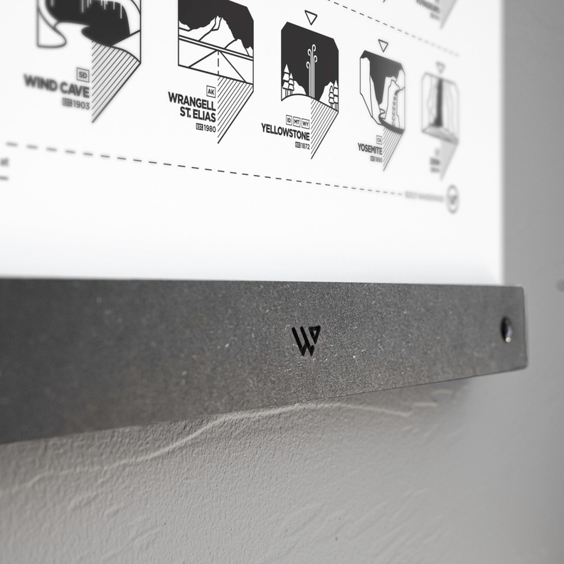 Black floating frame bar with embossed logo and mounting screw