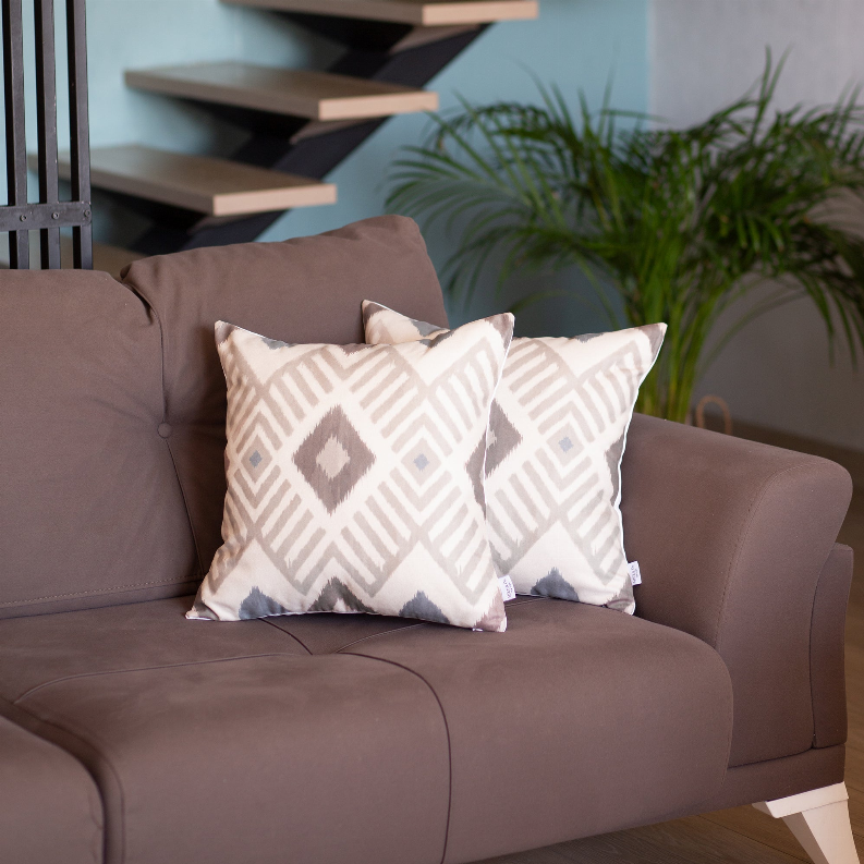 Square boho pillow covers with white and gray diamond geometric ikat pattern
