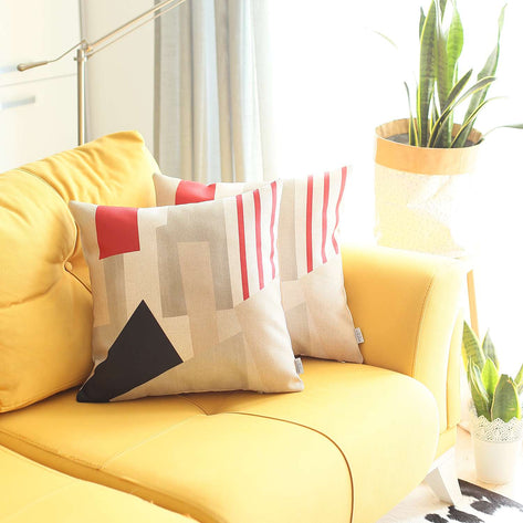 Geometric jacquard throw pillow cover with red stripe detail, gray blocks, and black triangle