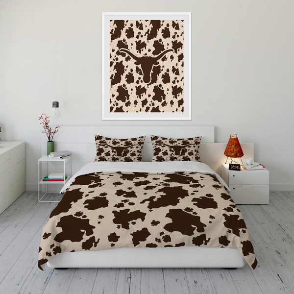 Brown and cream cow-print comforter set with matching pillow shams