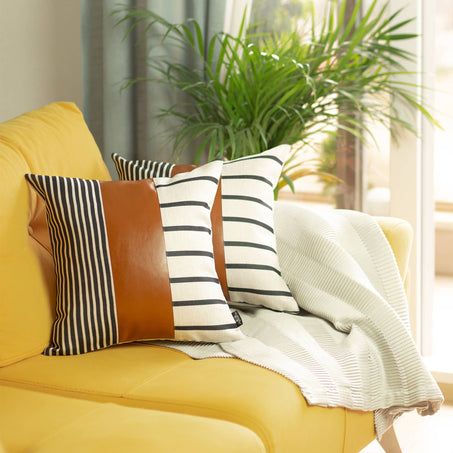Throw pillow covers with bold striped pattern and terracotta solid front panel
