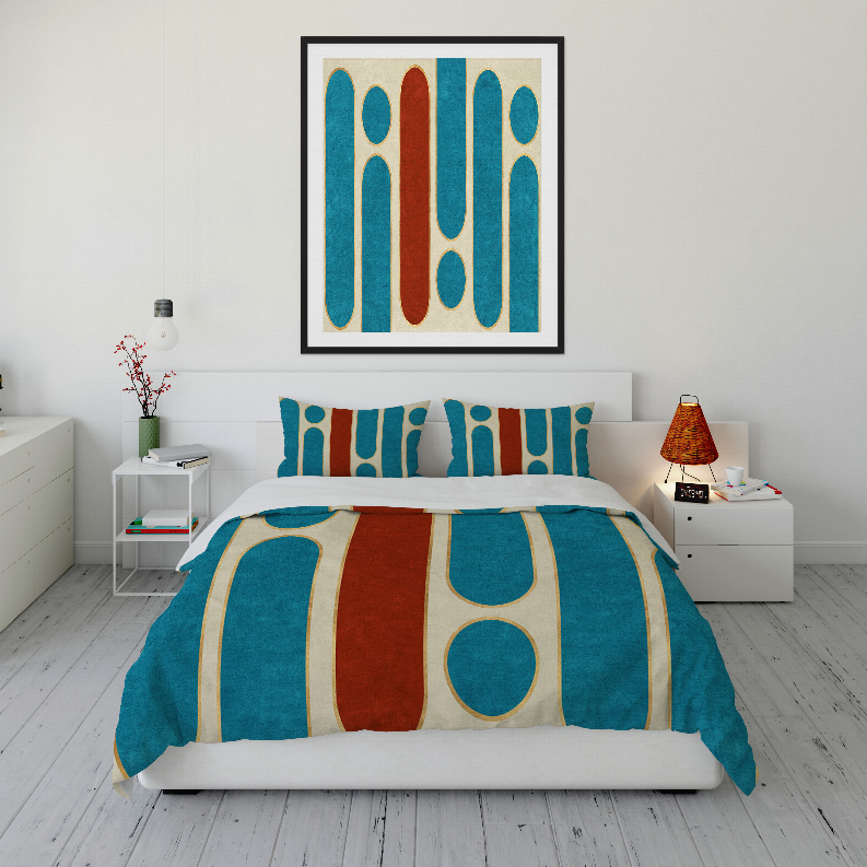 Comforter set with teal geometric stripes, oval dots, and cream trim on duvet